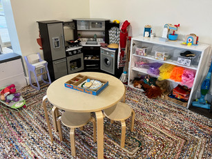 Pretend play table setup inside Itsy Bitsy Play Cafe.