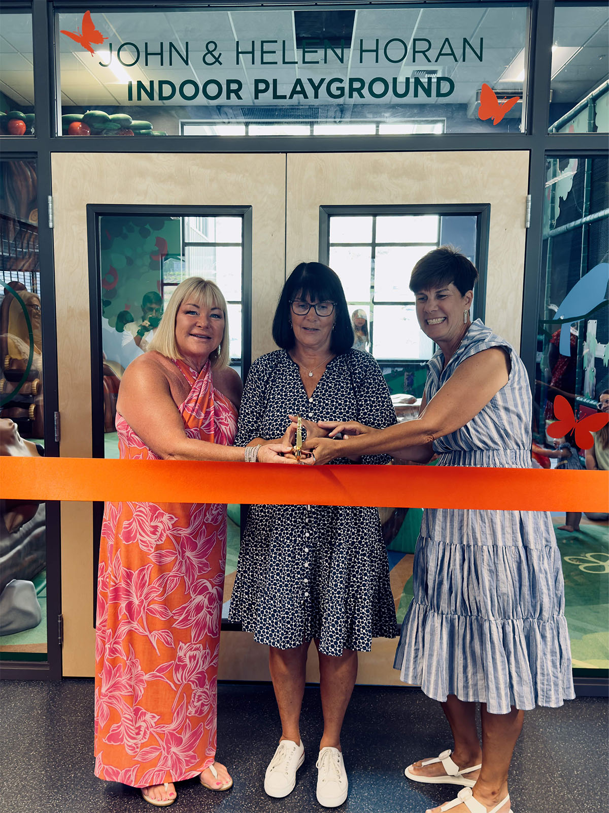 Ribbon cutting for the John & Helen Horan Indoor Playroom dedication in Chelan.