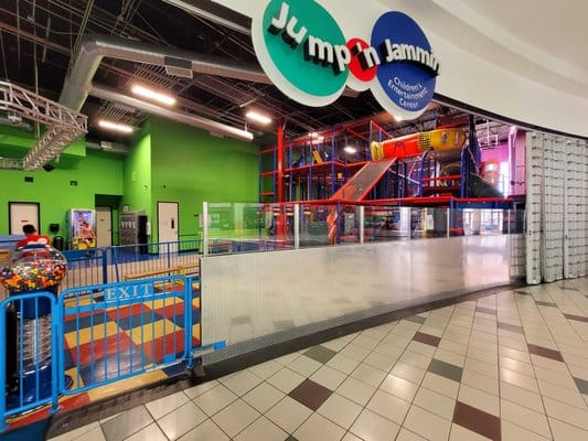 Indoor active-play areas inside Jump ’n Jammin at Moreno Valley Mall.
