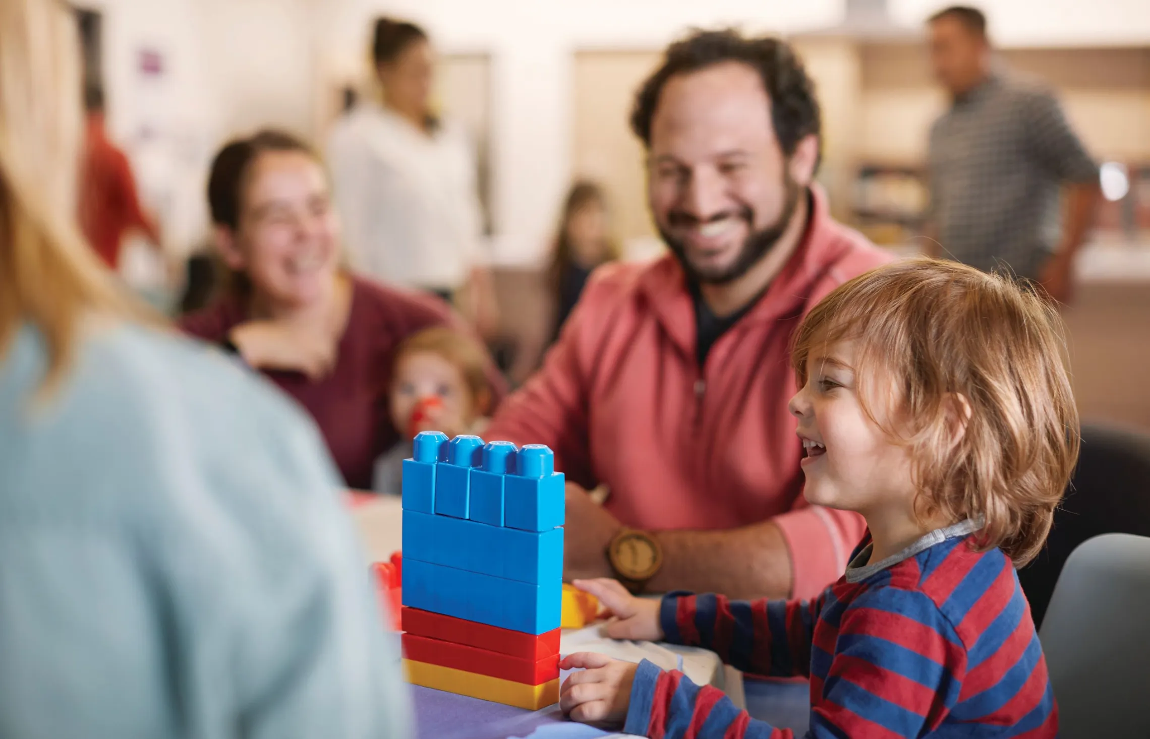 Children and caregivers during a YMCA Play & Learn session.