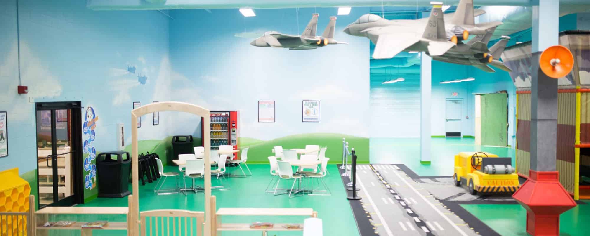 Seating and roadway play area at Kiddie Hawk Playground