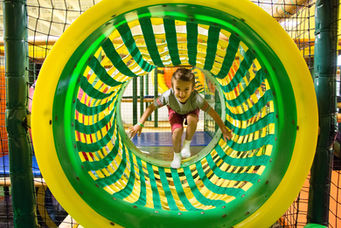 Colorful jungle-themed play features inside The Jungle.