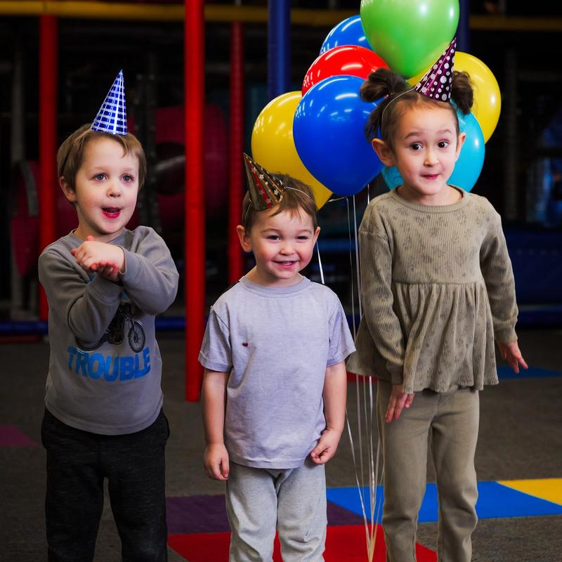 Additional view of children using the Club Northwest kids activity area.