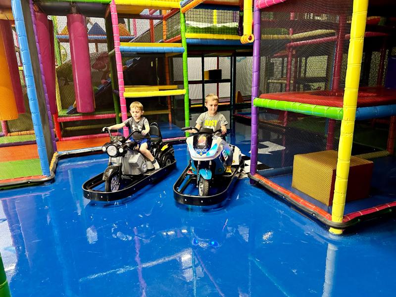 Play area and seating inside Kids Empire Kalamazoo.