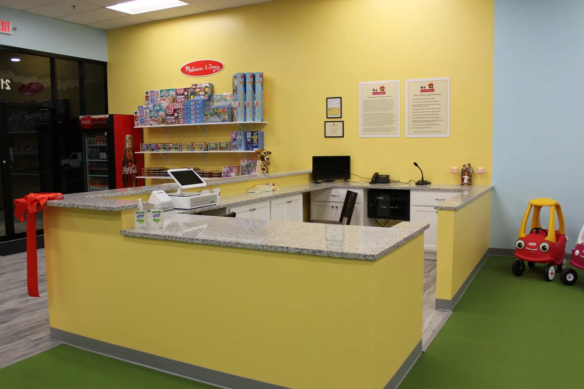 Play homes and child-sized setups at Kids Play Gallery.