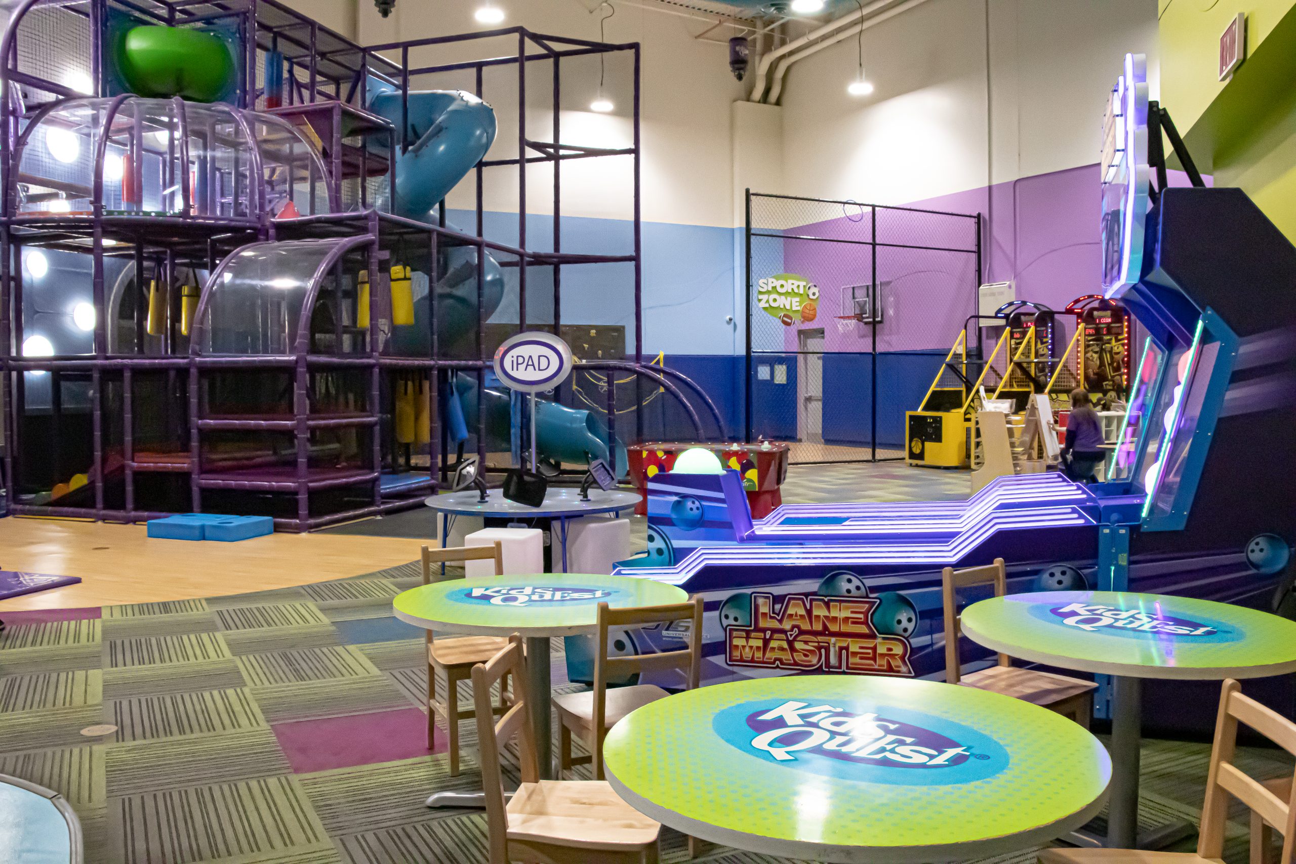 Children playing in the staffed Kids Quest space at Sunset Station.