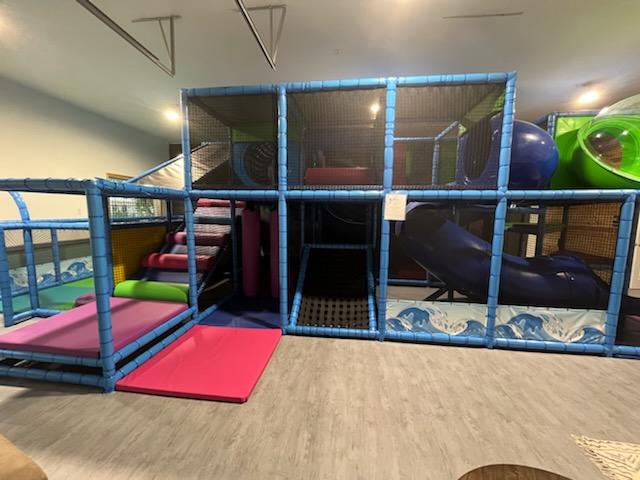 Slides and climbing features at Kidz at Play Family Cafe