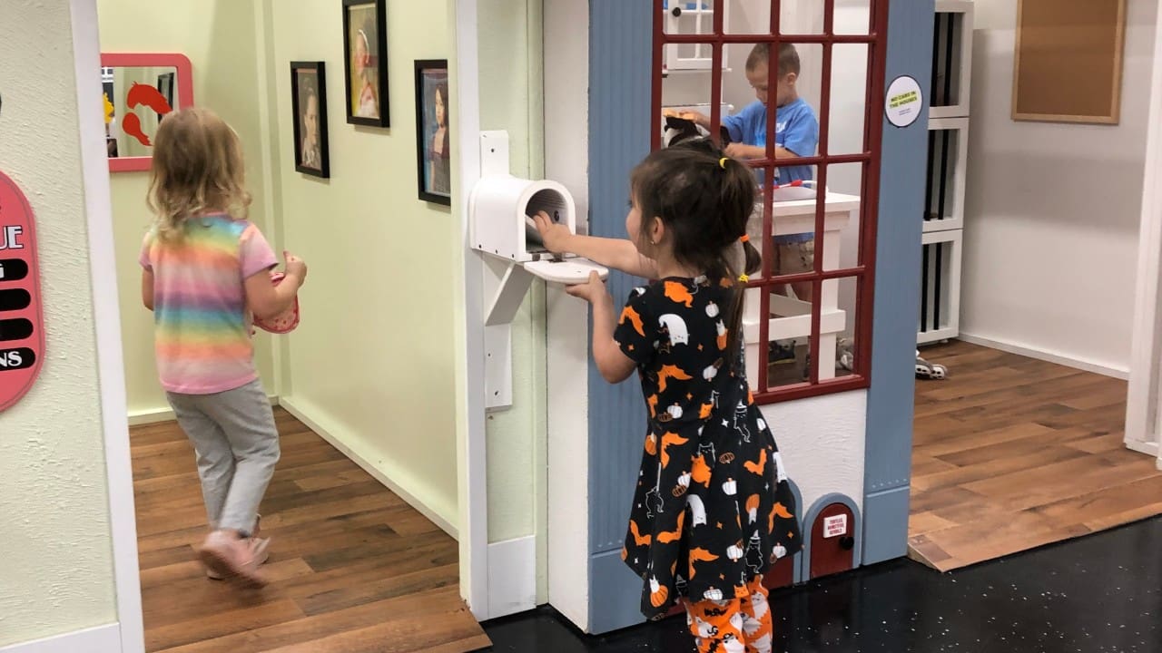 Pretend post office and role-play station at Kidz City.
