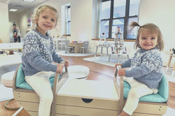 Kids playing in the bright Montessori-style room at Kidz Wishing Well