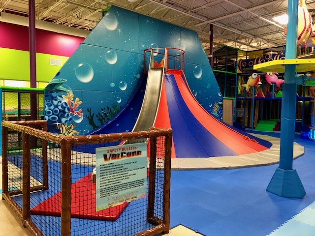 Indoor play area with climbing and active-play features at La La Land Boca Raton.