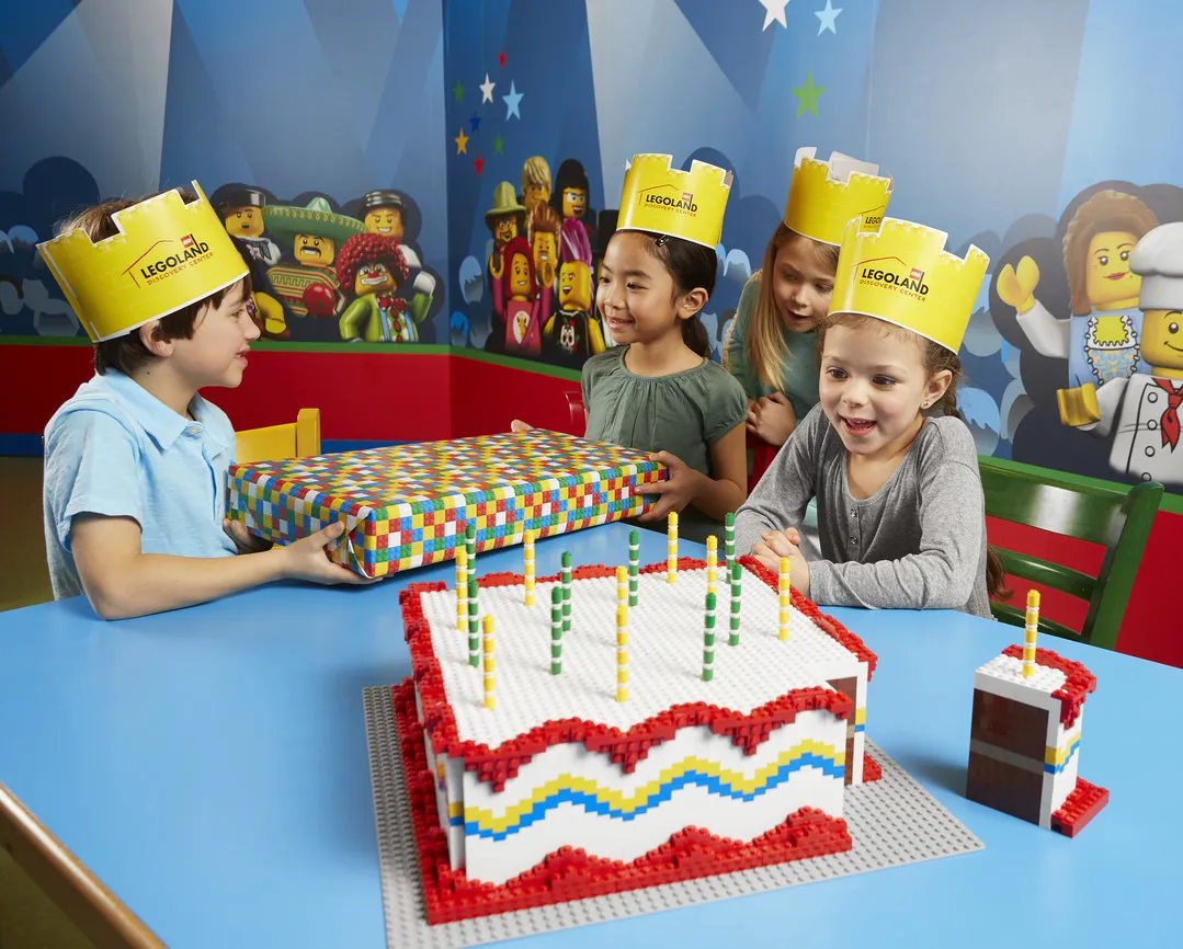 Children celebrating a birthday at LEGOLAND Discovery Center Columbus.