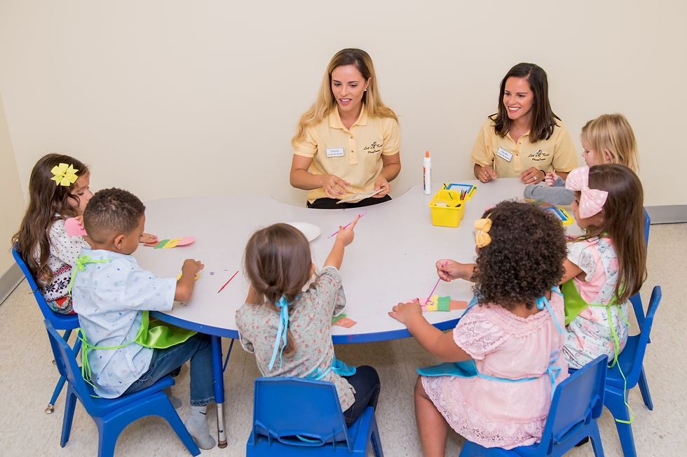 Children doing a craft activity at Let's Bee Kids PlayCenter.