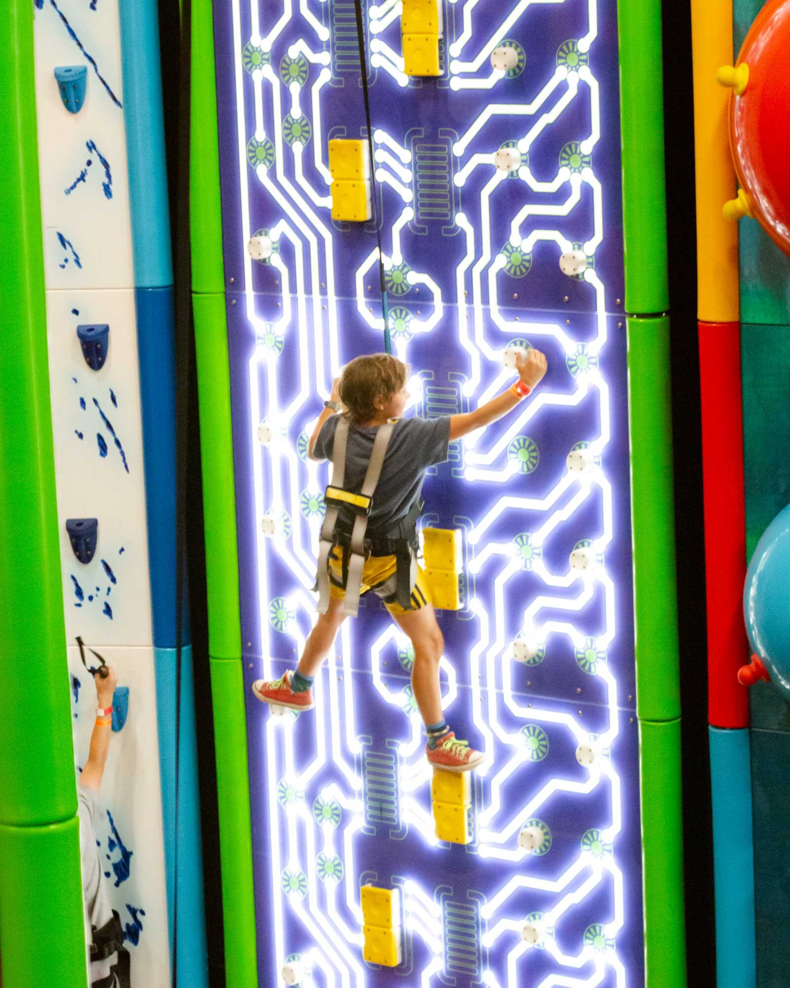 Child climbing at LiggettVille Santa Fe