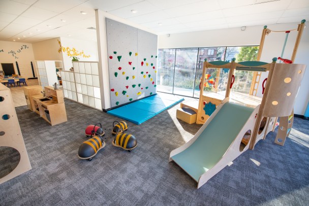 Small climbing structure and play floor at LilyPad Cincinnati