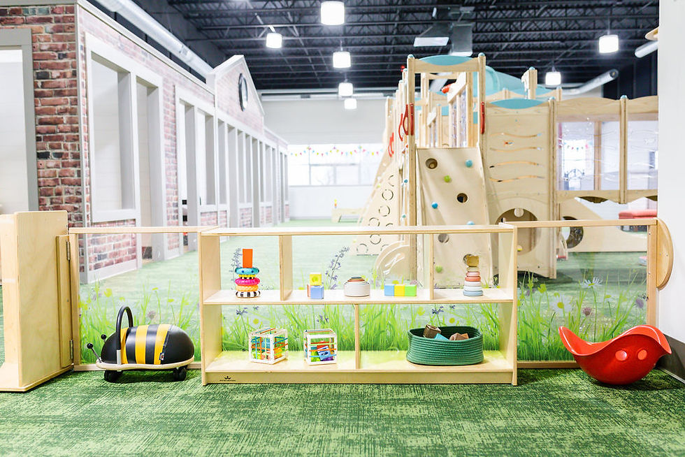 Open play area and large indoor structure at Little Explorers Play Cafe in Owensboro.