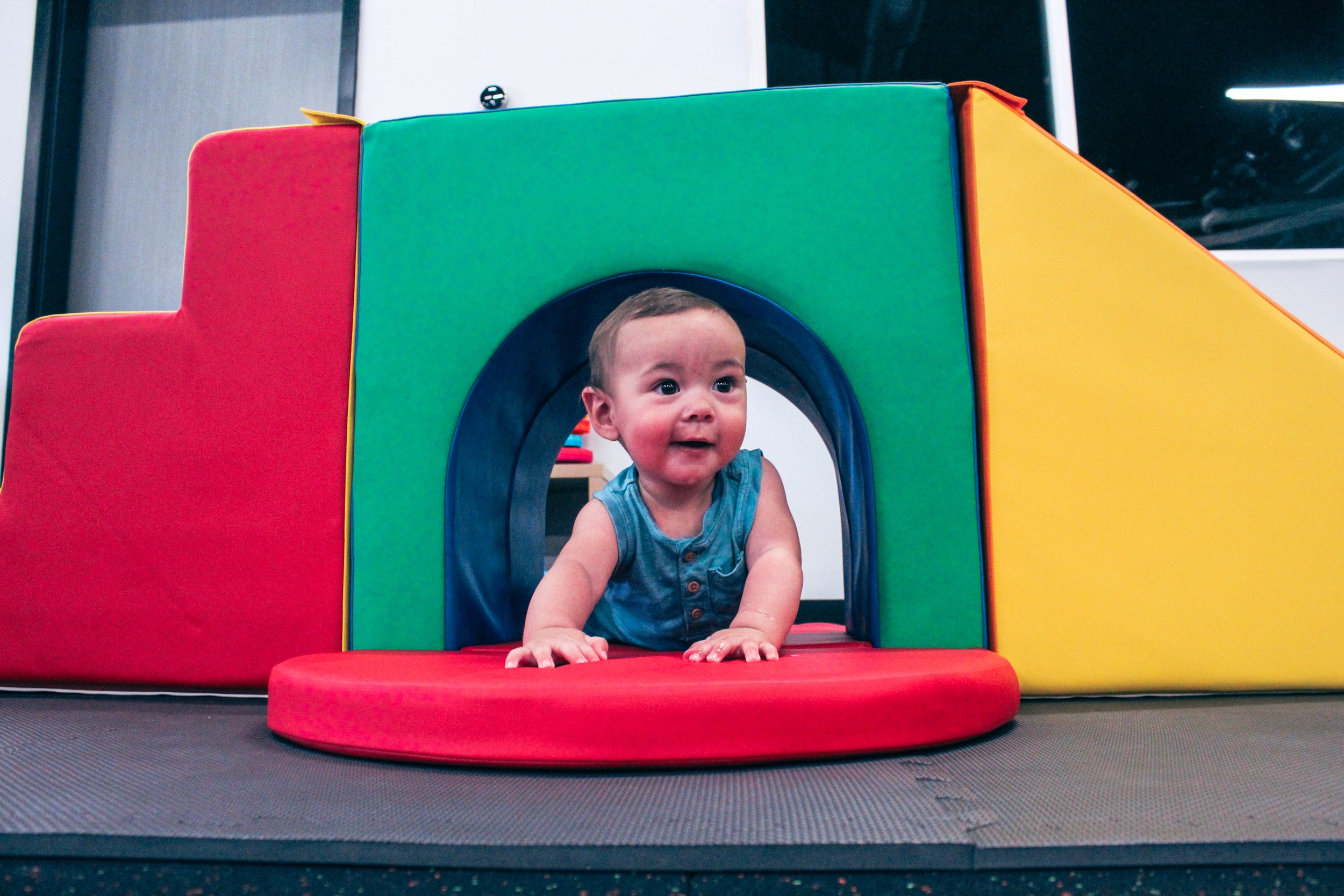 Indoor gross-motor play equipment at Little Land New Braunfels.