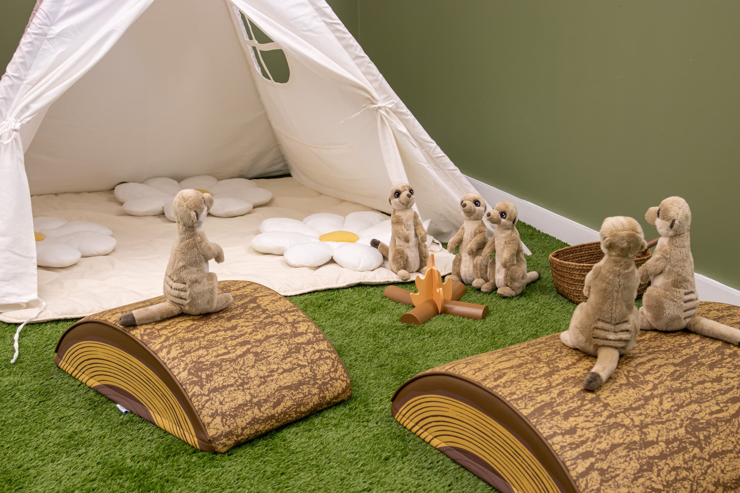 Soft teepee and pretend campfire corner at Little Leaps Play-Cafe.