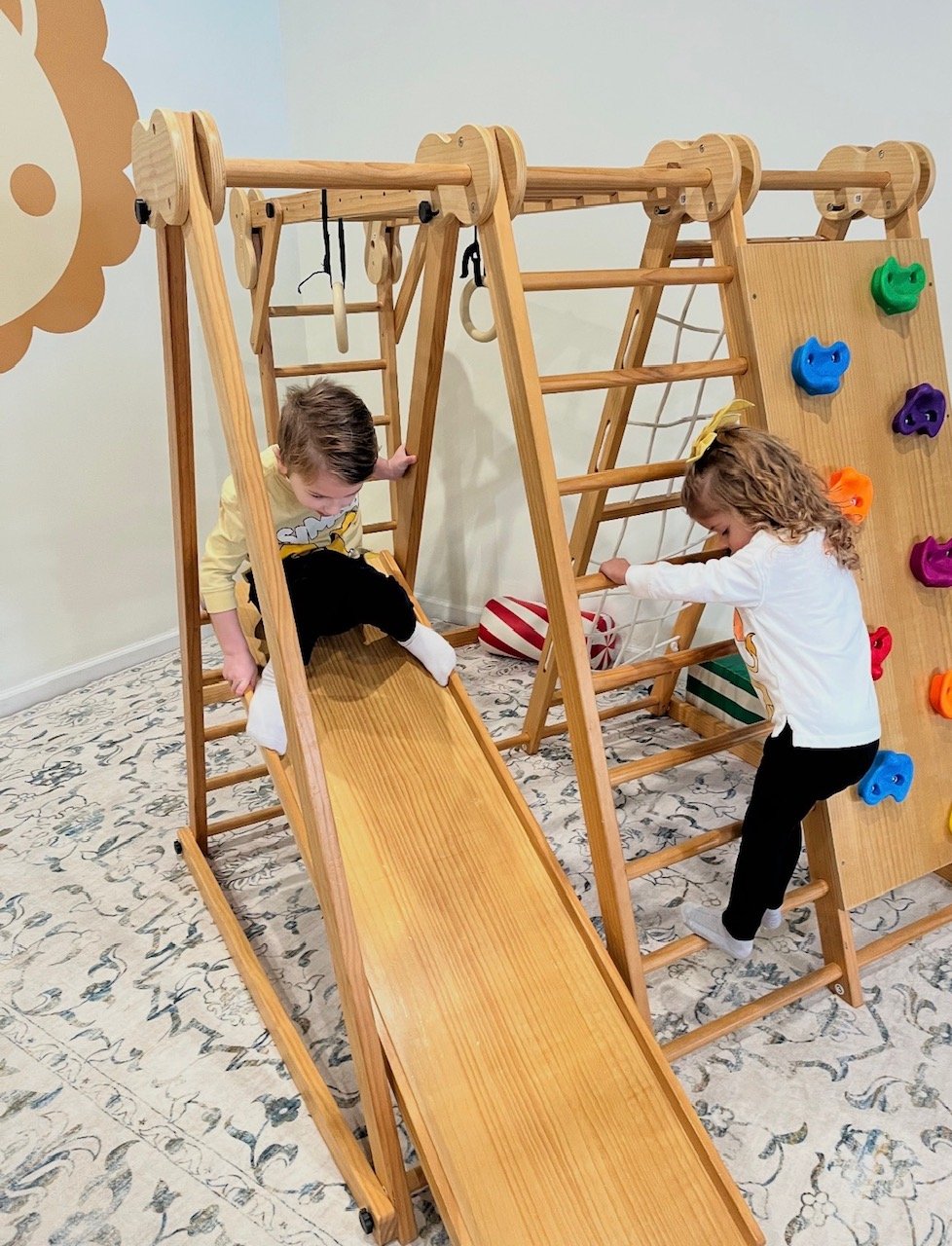 Soft play and climbable toddler setup at Little Lions Den