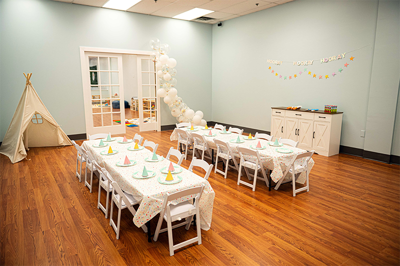 Cafe-style parent seating at Little Lions Play Den.