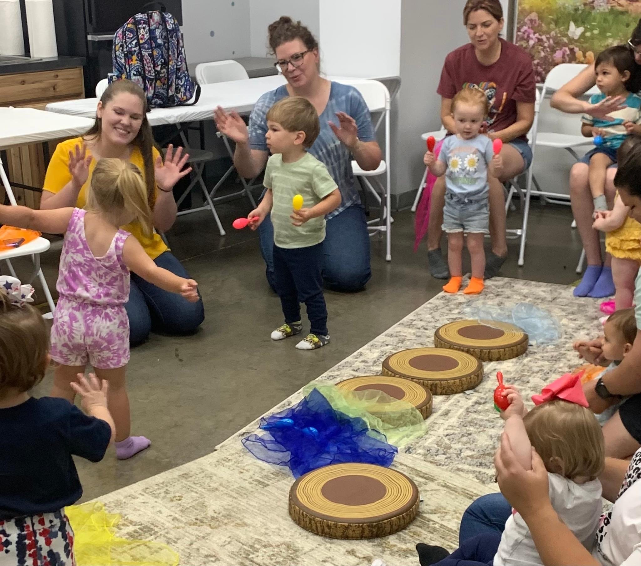 Children gathered during a Little Playland class or group activity.