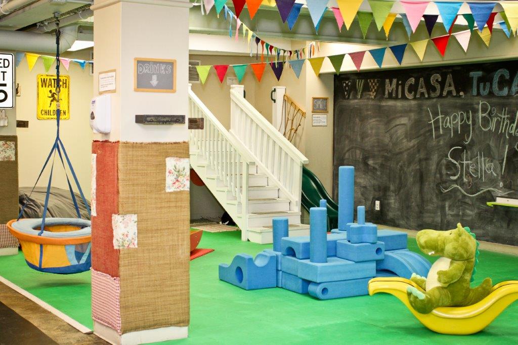 Young children playing inside Lulu's Casita