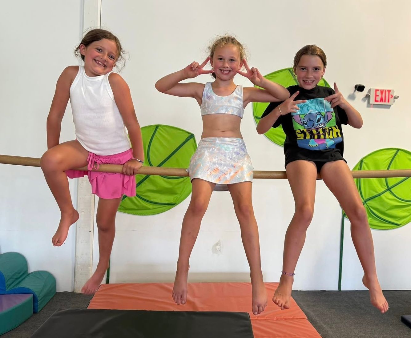 Children using bar equipment inside The MAYCA Studio