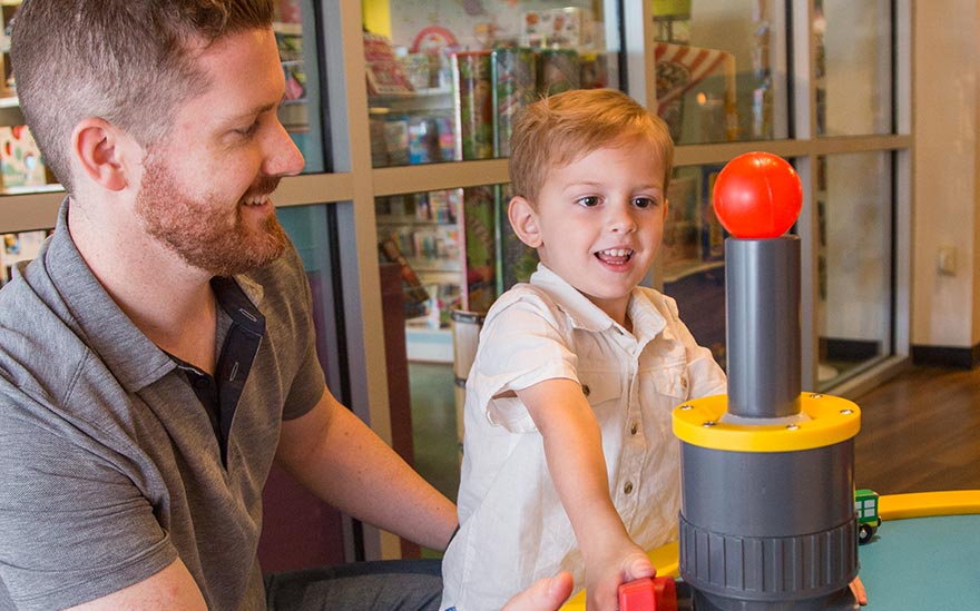 Children using hands-on air and motion exhibits at McKenna Children's Museum.