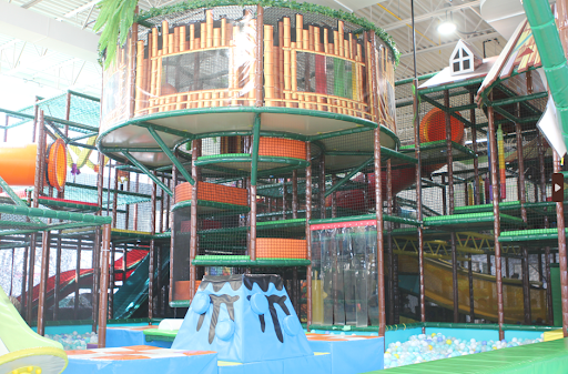 Indoor climbing structure and ball area at Me Land