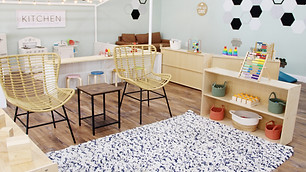 Pretend kitchen and seating area at Mezanmi Play Cafe