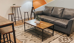 Adult lounge seating inside Mezanmi Play Cafe