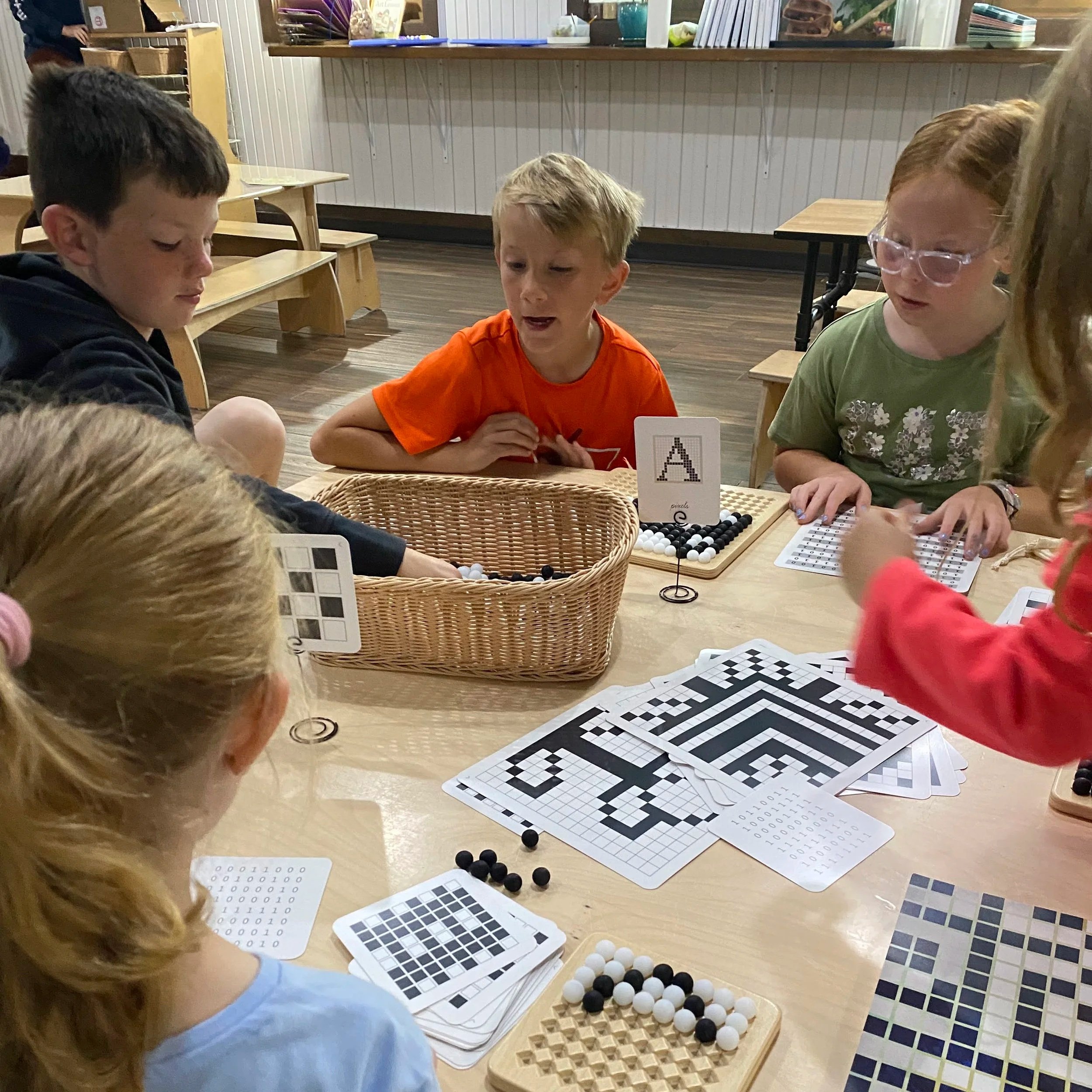 Children exploring hands-on play stations at MHK Play Studio