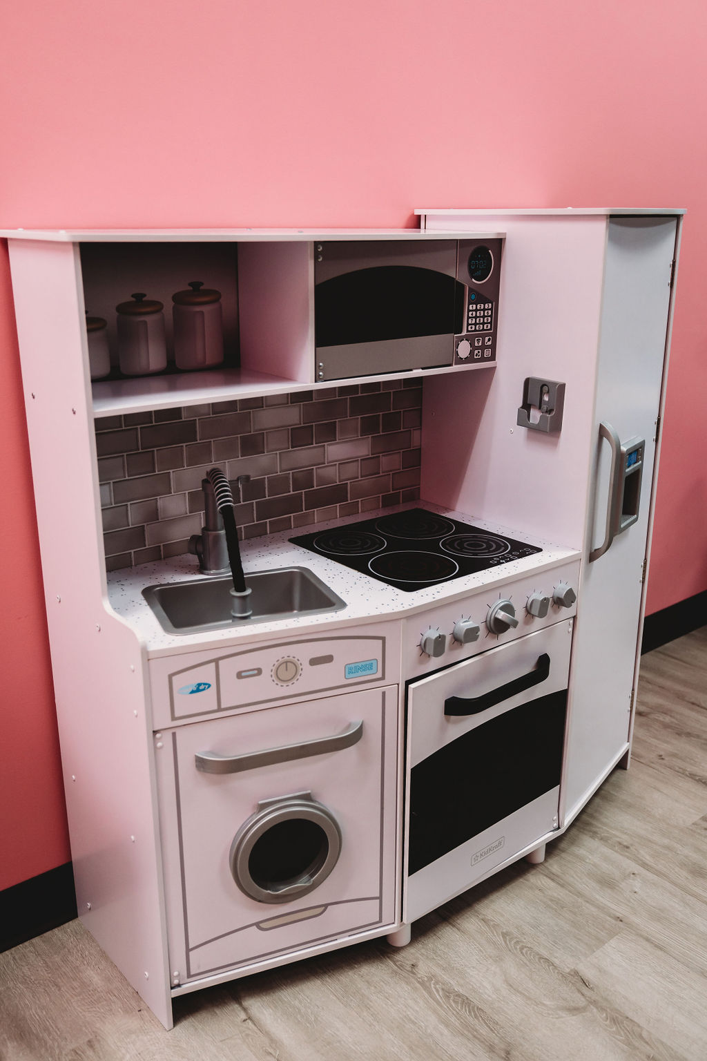 Pretend kitchen area at Mia's Place CNY.