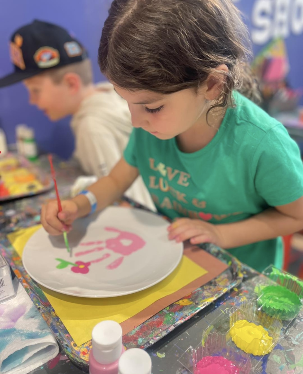 Children exploring a themed imaginative play area at Minnesota Playseum.