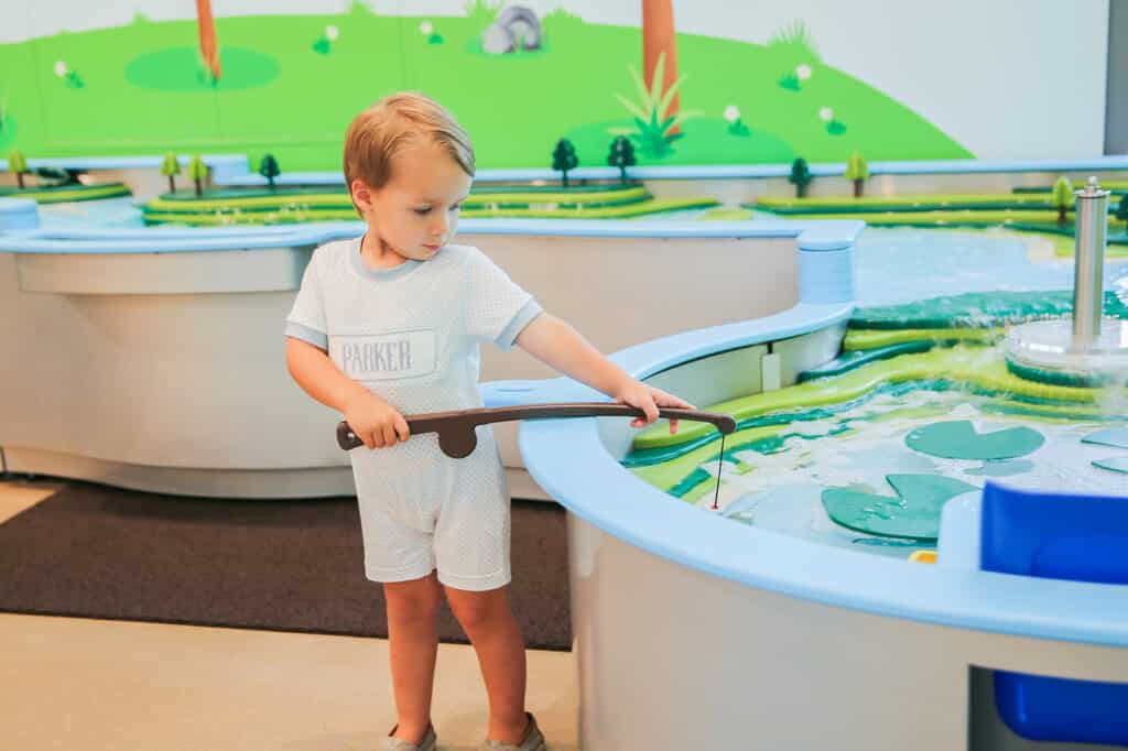 Children exploring an interactive exhibit at Mississippi Children's Museum - Meridian