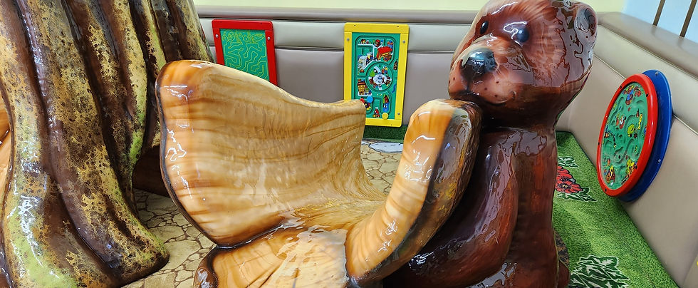 Woodland-themed toddler play corner at Munchkin Playland.