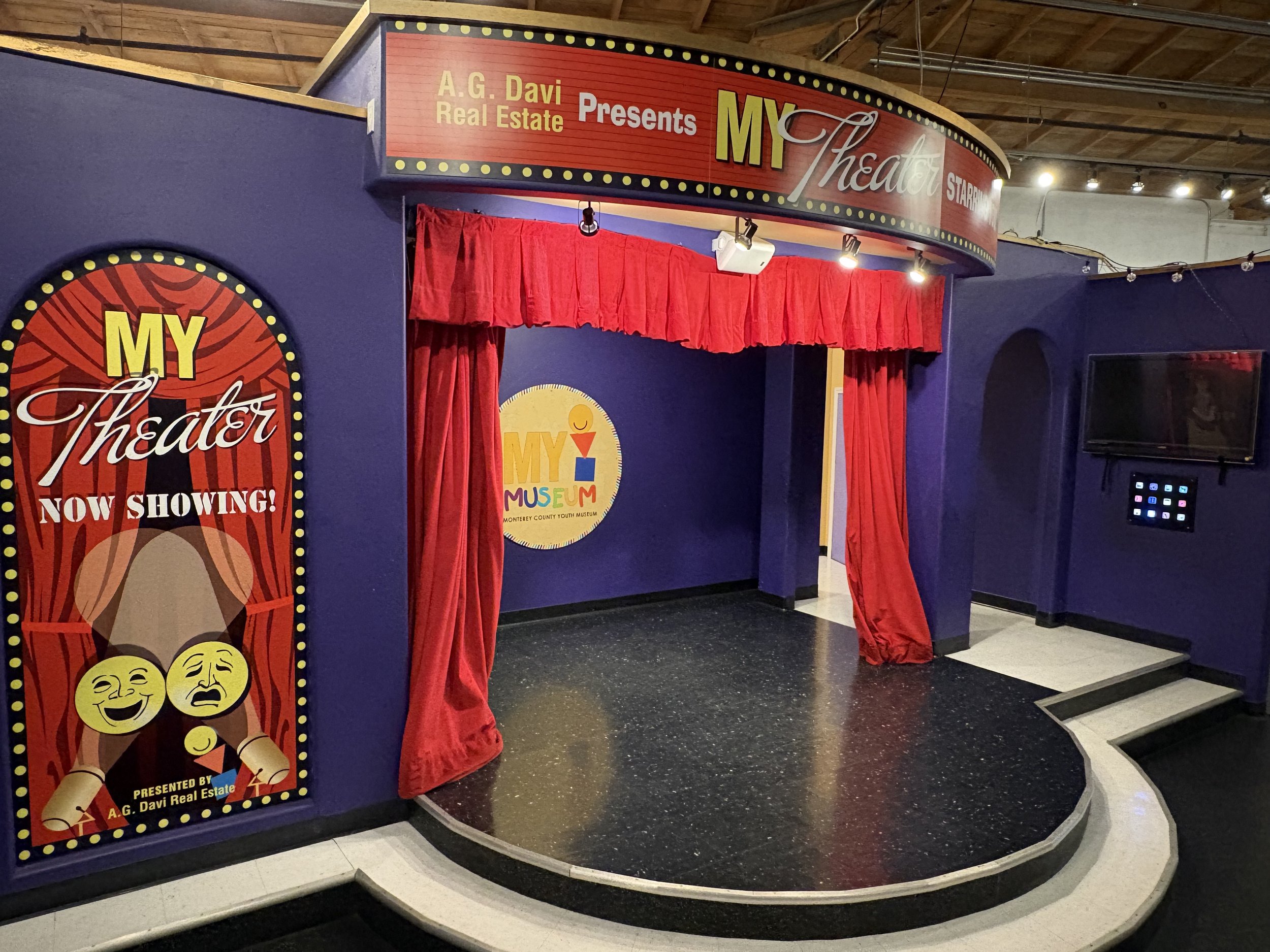 Children in the theater exhibit at MY Museum.