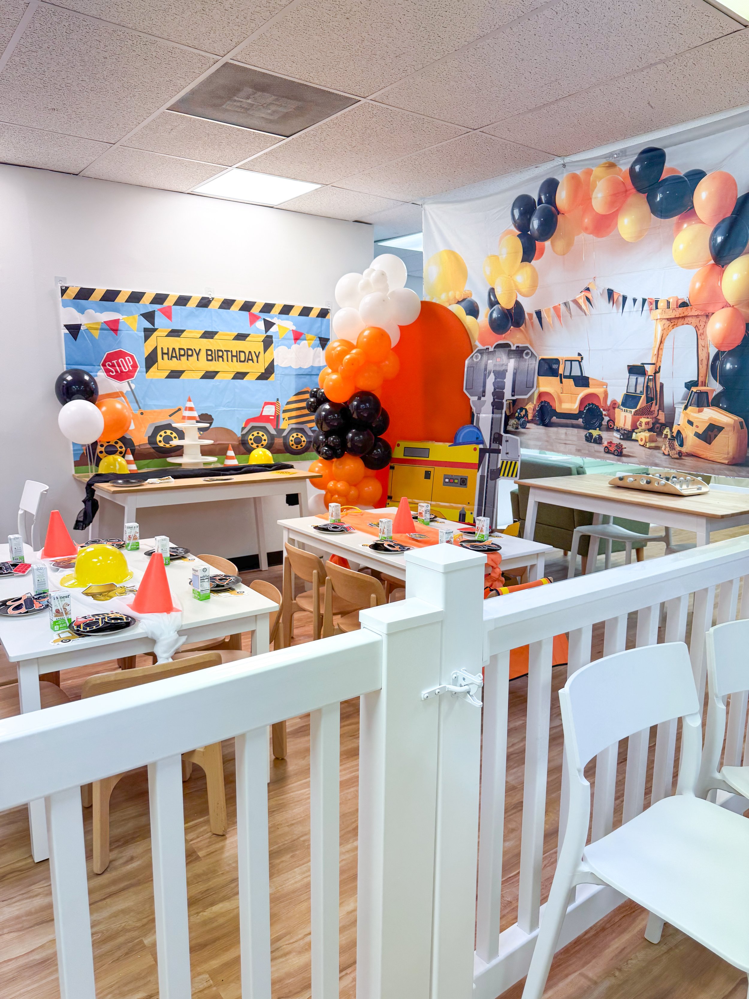 Construction-themed party setup at Natural Nest Play Cafe Newark.