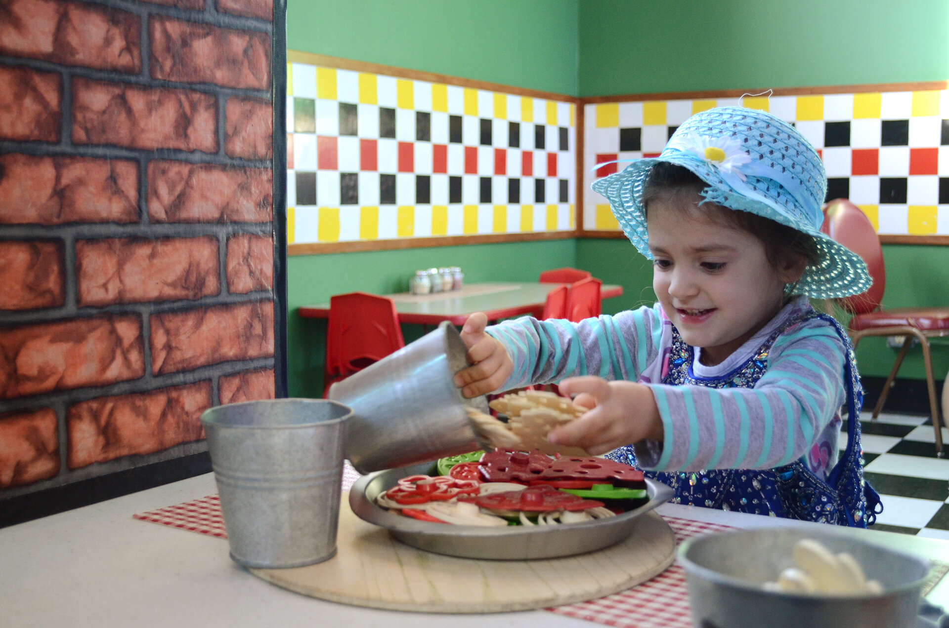 Pretend kitchen and restaurant play at North Platte Area Children's Museum