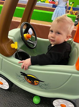 Pretend-play vehicle area at NorthWest Soft Play Event Center.