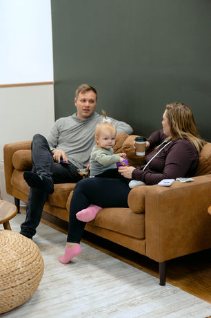 A parent lounge area inside Nurture To Play.