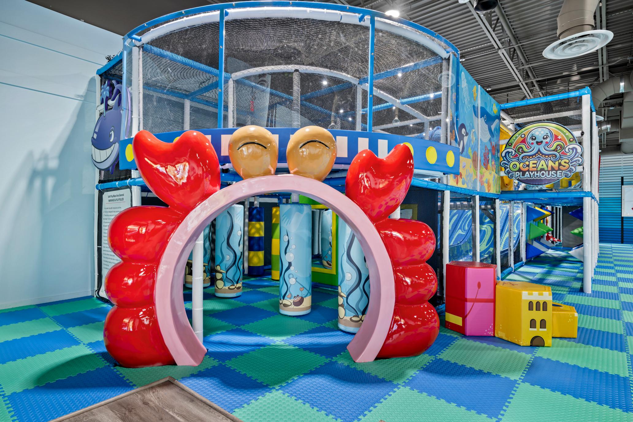 Main indoor climbing and slide structure at Ocean's Playhouse