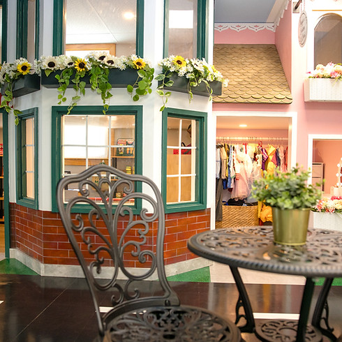 Children's play scene inside Ohana Clubhouse.