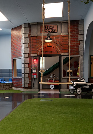 Station 17 Fire House pretend-play area at Ohana Clubhouse.