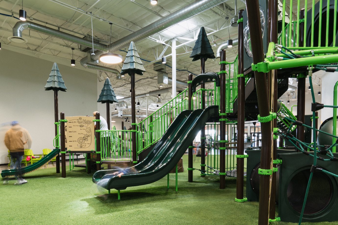 Play structure and surrounding seating at Park Collective