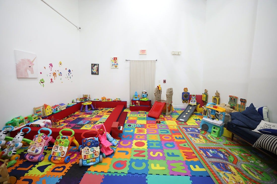 Lower-key toddler and toy room at Planet Kids Playground & Cafe.