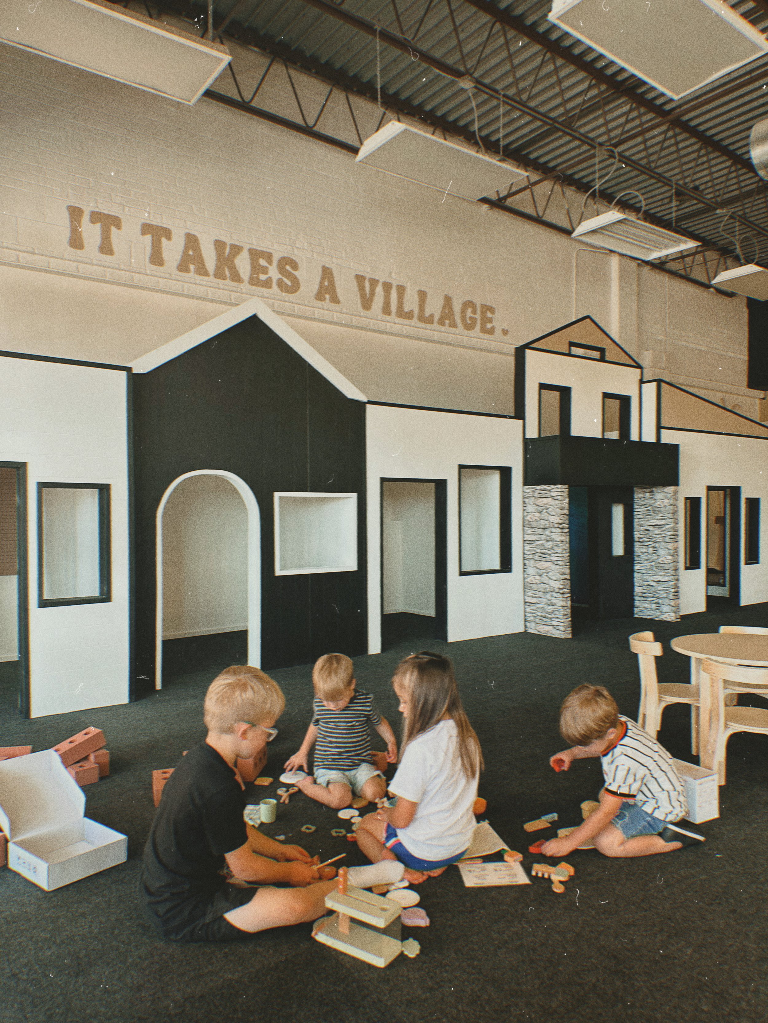 Play & Party Co. mini town playhouse area in Wichita.