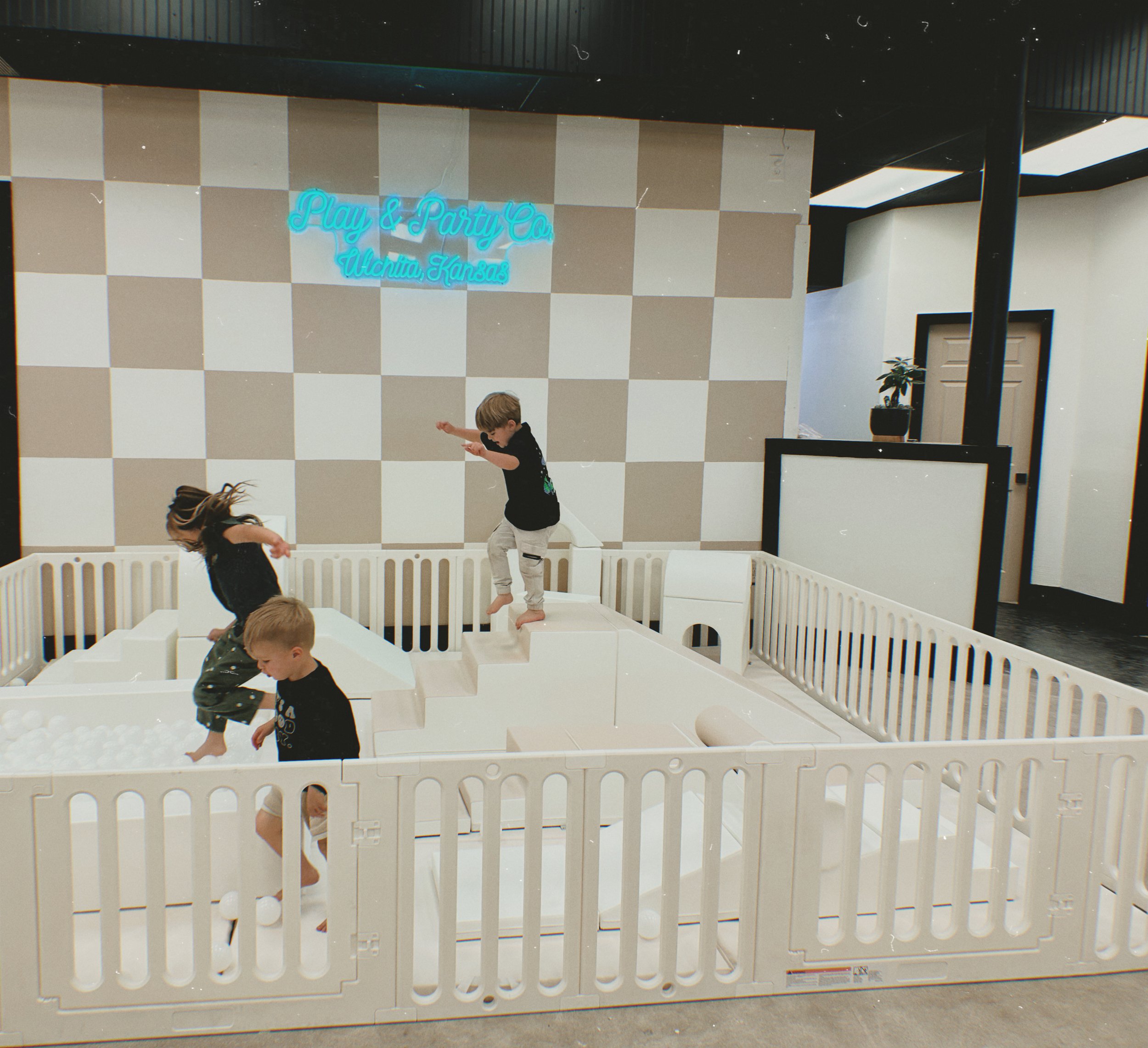 White soft-play zone at Play & Party Co. in Wichita.