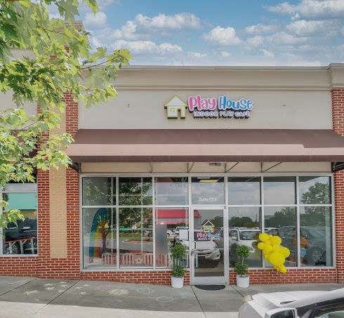 Storefront entrance of Play House Fort Mill.