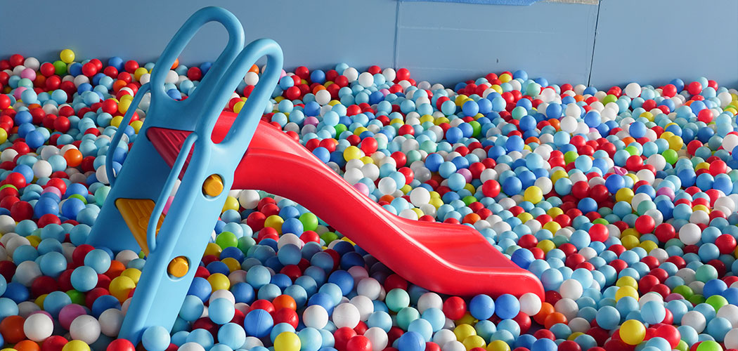 Main soft-play zone with ball pit and slide at Play Land.