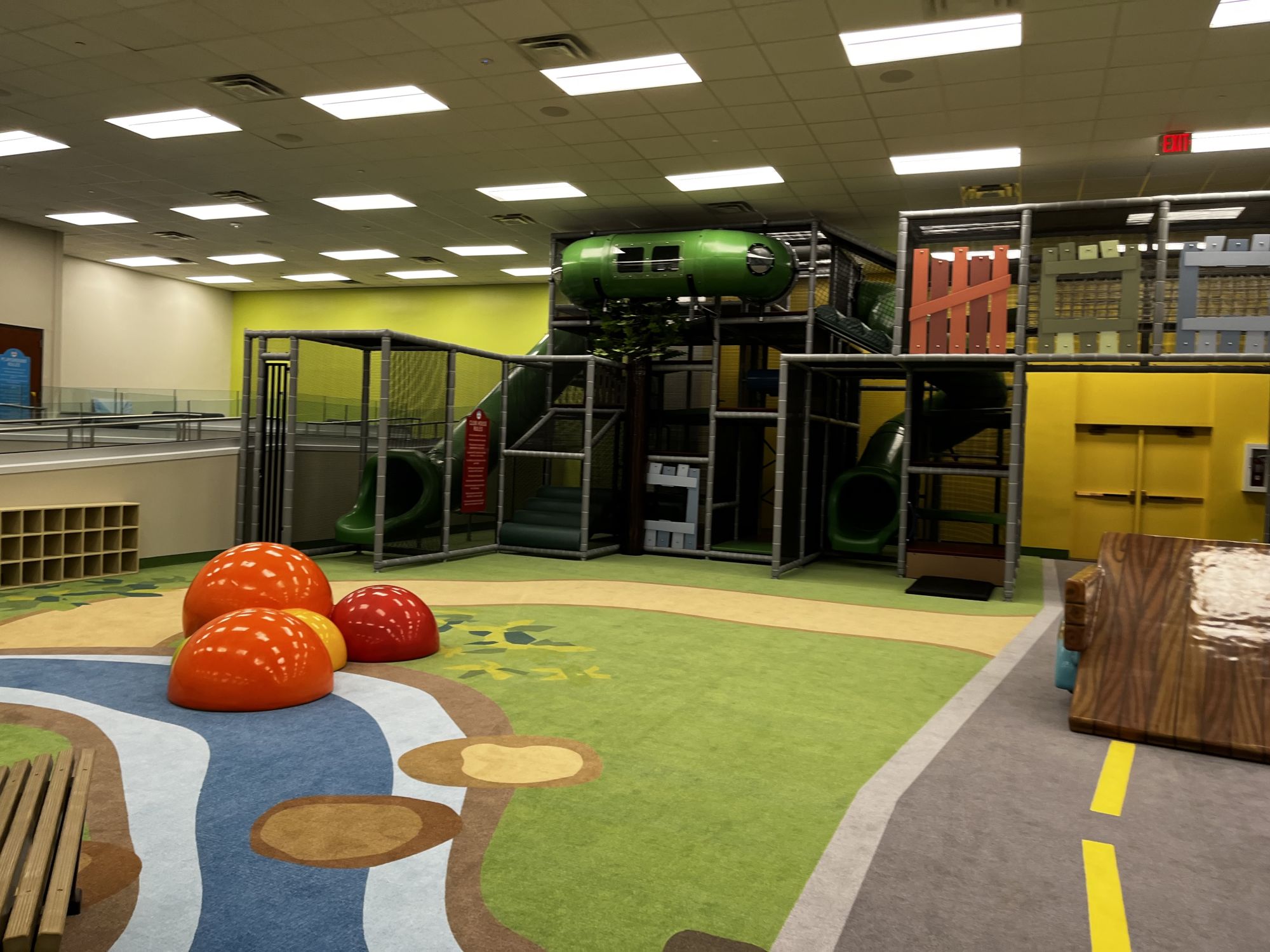 Indoor play area with equipment and seating at Play Town & Café.
